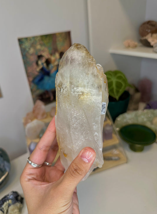 clear quartz with lodolite and iron oxide inclusions