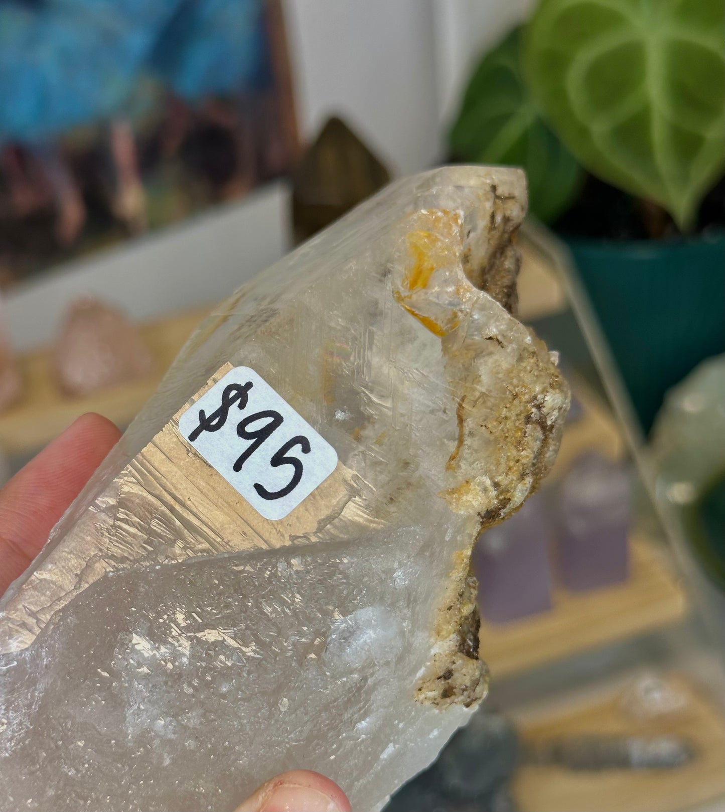 clear quartz with lodolite and iron oxide inclusions